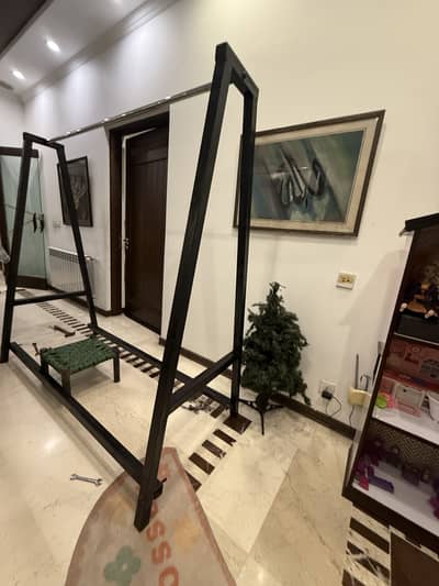 6ft tall and made out of steel pipes very durable