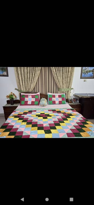 bed, side tables and dressing table