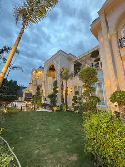 FULL FURNISHED WITH POOL, THEATRE, GYM AND LIFT 2-KANAL ELEGANT AND BRAND NEW SUPER HOT LOCATED BUNGALOW IS AVAILABLE IN THE BEST BLOCK OF DHA LAHORE