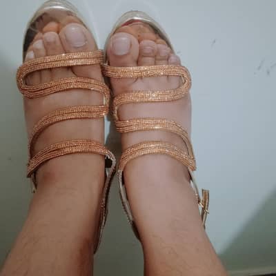 Golden fancy heels