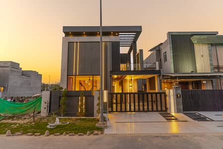 Modern Luxury In Phase 7 - 10 Marla Bestseller A Masterpiece Designed By Awais Mughal ( Under The Roof ), Constructed By Masa Construct This Sleek 4-Bedroom Home Seamlessly Integrates Architecture And Nature