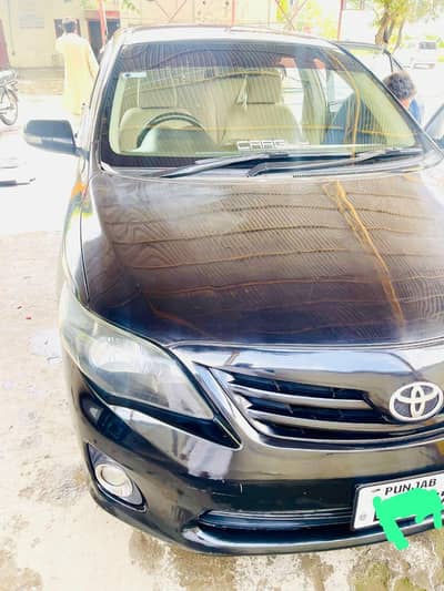 2012 by 2013 Toyota Corolla