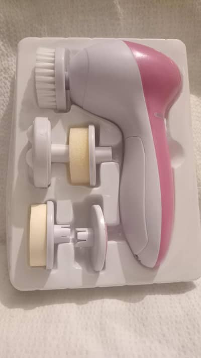 Beauty care massager with five in one function