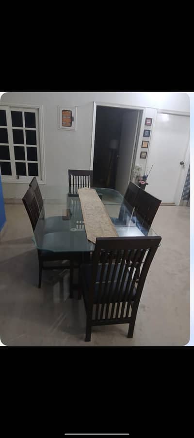 6-seater wooden dining table