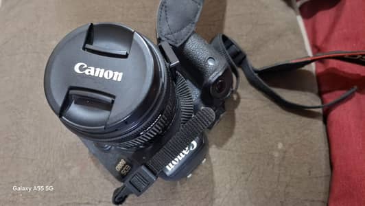 Canon 800D along with charger and bag