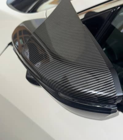 Batman style carbon fiber cover