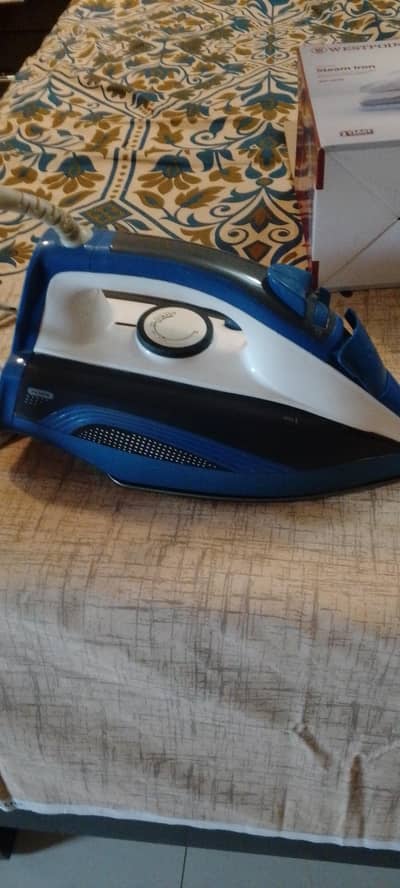 west point brand automatic steam iron and national iron.