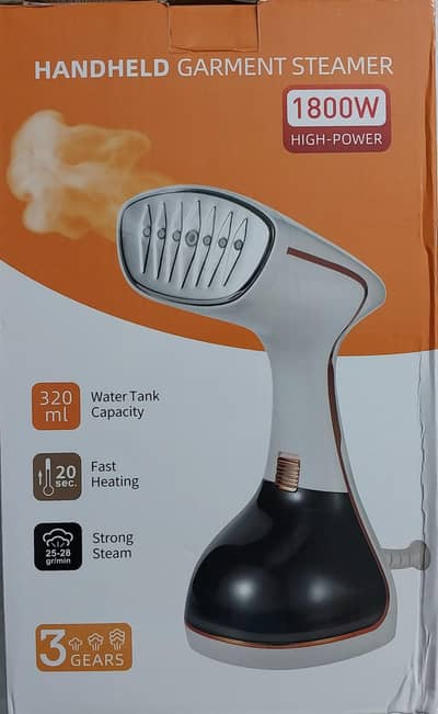 Handheld garment steamer