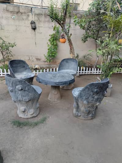 CONCRETE CHAIR AND TABLE IS AVAILABLE FOR LOAN (4 chair 1 table )
