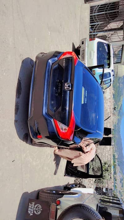 Civic with golden number