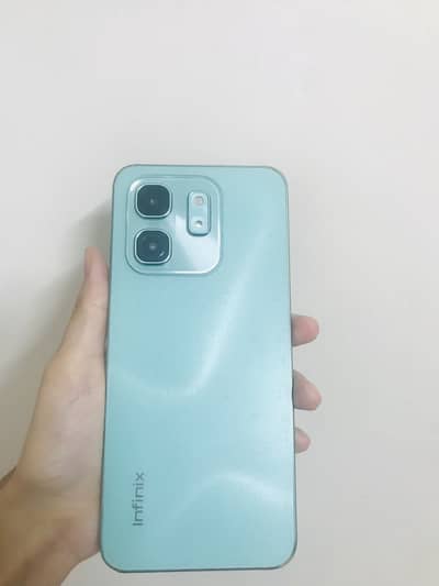 Infinix Hot 50i / 4 months warranty (free cover )