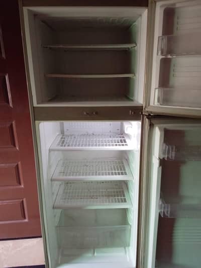 pel refrigerator Total junine hai