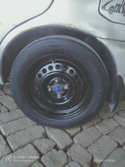 BG TRACKO 185.60. 15 Tyres and original Yaris 15 inches rims