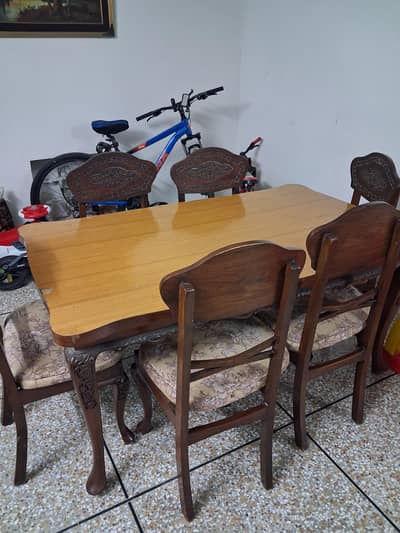 wooden dining table with 6 chairs