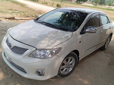 Toyota Corolla xli converted Gli 2013 model, 14 Ka number ha.