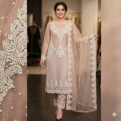 ​Design: Intahai khoobsurat aur naya pal motiyon ka kam behtarin dress
