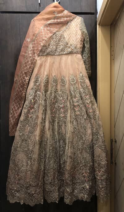 Elegant designer-style ethnic gown set, perfect for weddings and fest