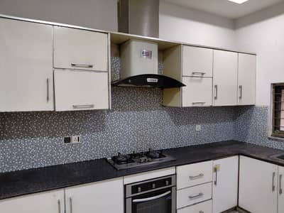 10 Marla Tile floor luxury full independent house is for rent in Wapda Town phase1 Block K3.