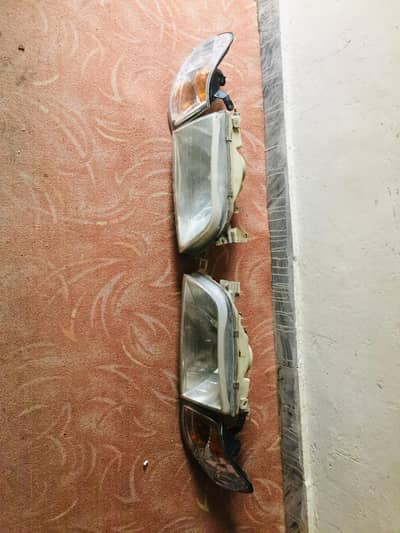 XE Corolla front headlight complete set up for sale in good condition