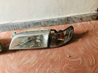 XE Corolla front headlight complete set up for sale in good condition