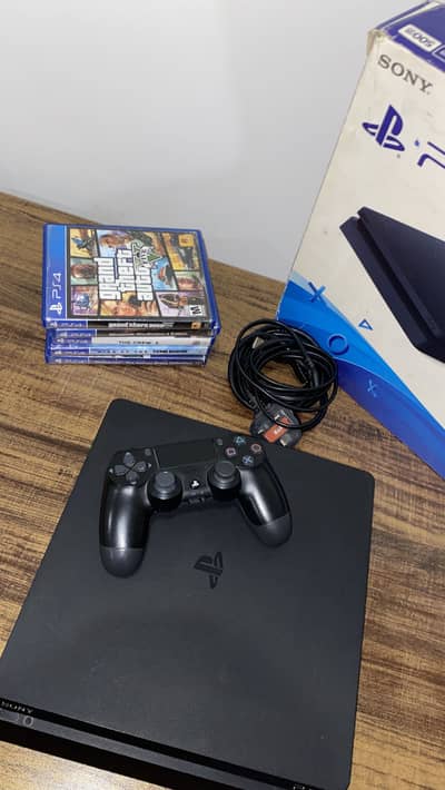 PS4 Slim 500gb (with 5 disc games and box)