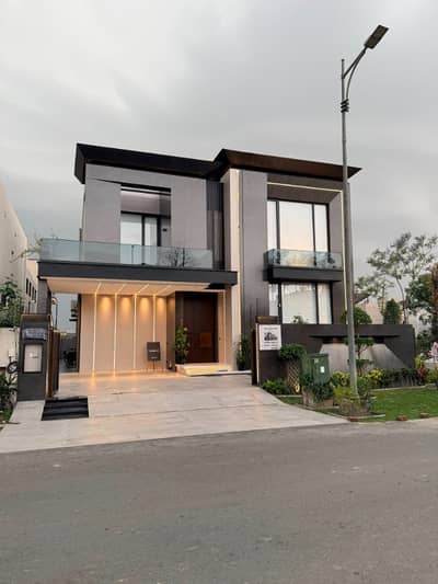 One Kanal Corner Brand New Luxury Ultra-Modern Design Most Beautiful Fully Furnished Bungalow 2 Servant Quarter In Basement For Sale At Prime Location Of DHA Lahore Near To Park Masjid & Commercial Market.
