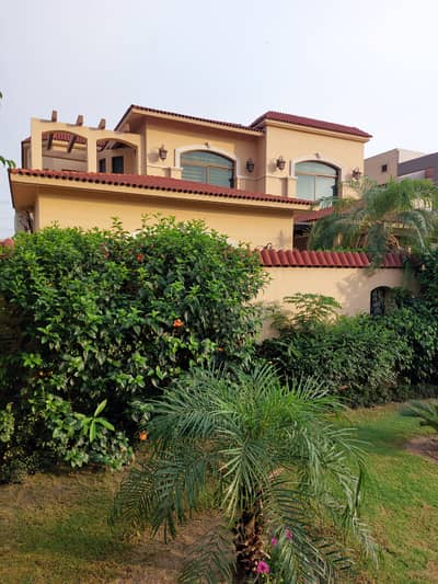 One Kanal Slightly Used Spanish Design Owner Build Well Maintained Bungalow For Sale At Prime Location Of DHA Lahore Near To Park Masjid & Commercial Market