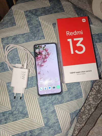 new Redmi 13 in Black color 8/128 gb for selling in full warranty