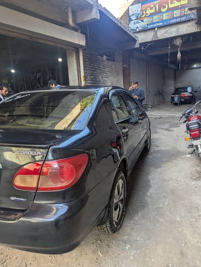 Corrolla XLI converted to GLI  2005 model. black