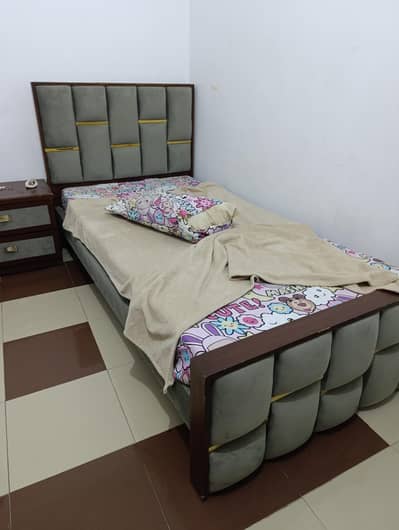2 Single Beds With Centre Table
