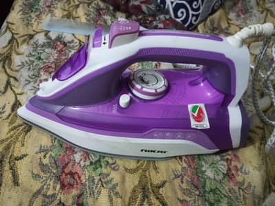 NIKAI steamer iron brand new only few days use