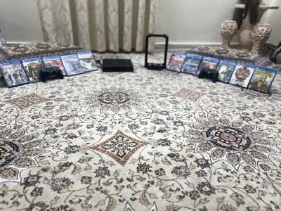 Ps4  slim  1tb ( 1000gb) + 11 cds + 2 controller + stand for sale