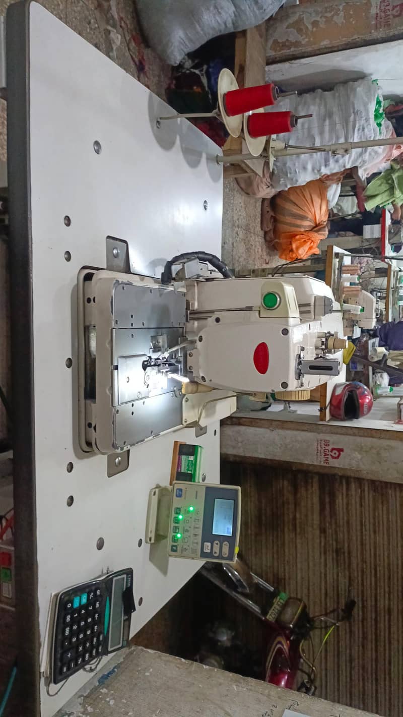 Eyelet 9820 button machine & feusing plant 5
