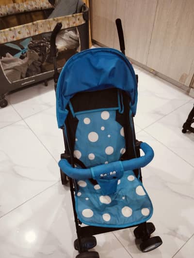 A baby prams usually called a baby stroller