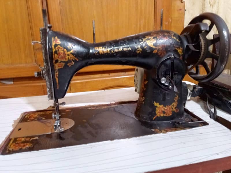 sewing machine with proper table set 1