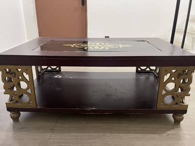Coffee table with glass top