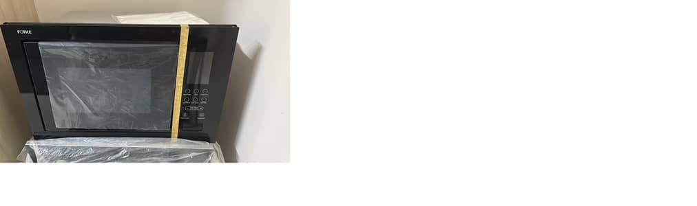 Brand new Fotile Micro Wave Oven, with operating manual.