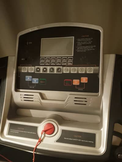 Tread mill.  With tummy trimmer . Slightly used.