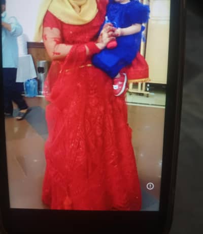 Red lehnga with potli