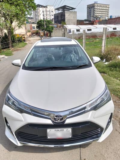 Toyota Corolla grande 1.8 with black interior first owner