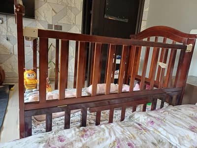 Wooden cott with matress attatchable with bed and convertable into bed