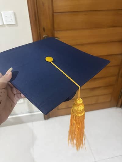 Blue graduation coat with cap