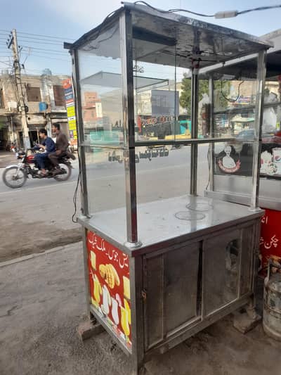 Display items golgapy dhee bhallay fruit chatt samosa pkora jalabi