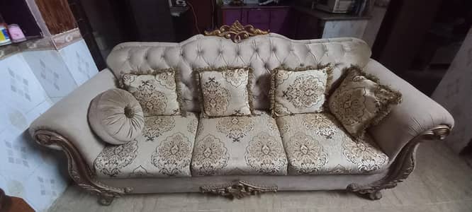 5 seater sofa set along table