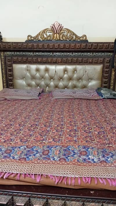 double bed with side table and mattress