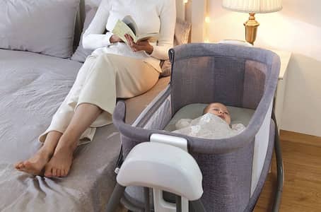 4 in 1 swinging bassinet/cot