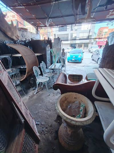 salesman or worker at furniture decor shop