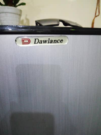 Dawlance room fridge/9106 R