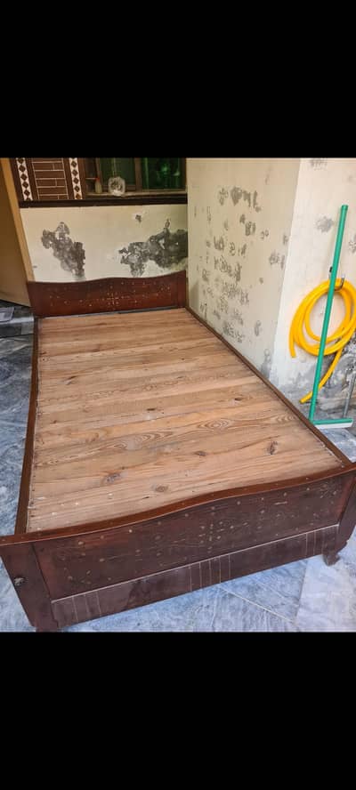 2 single wooden beds . can be used as double bed. very good condition