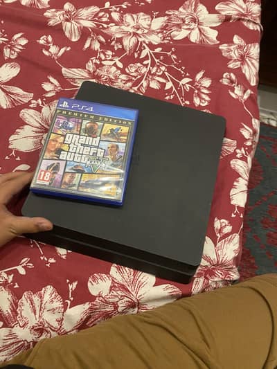 PlayStation 4 slim with free gta 5 disc